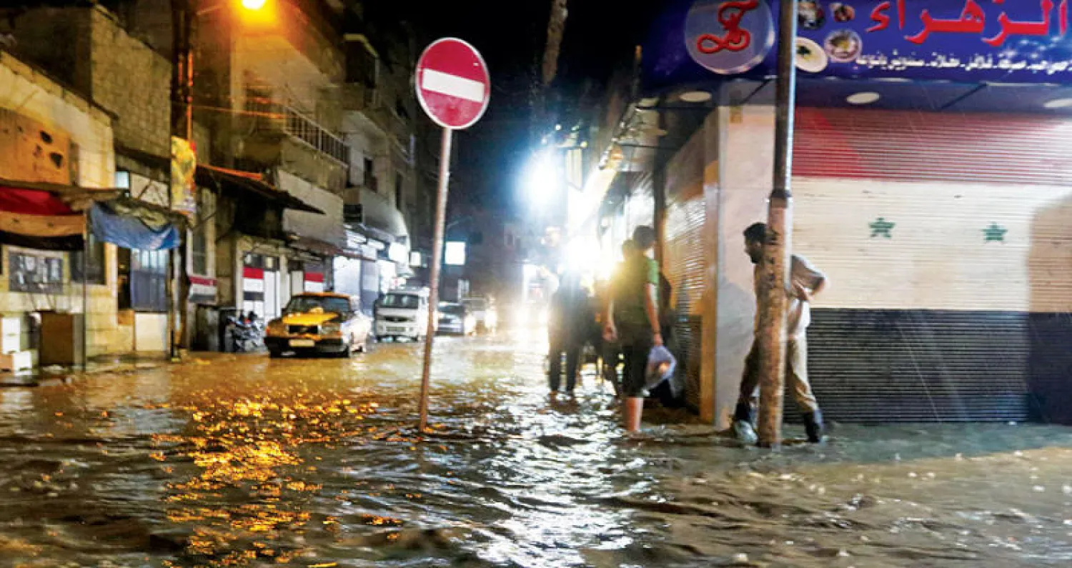 توقف حركة المرور في دمشق إثر أمطار غزيرة ضربت العاصمة السورية (إ.ب.أ)