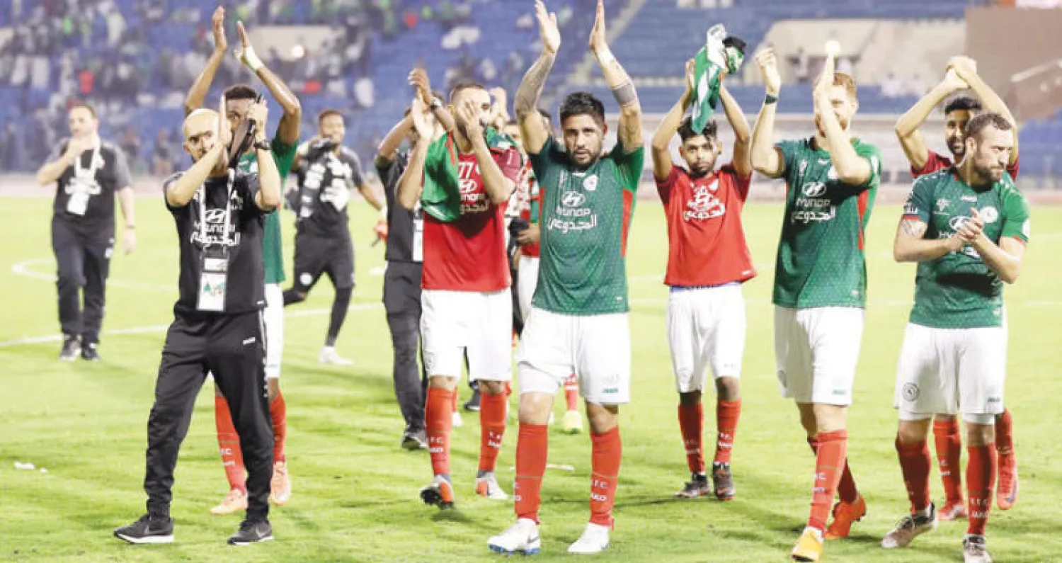 لاعبو الاتفاق يحتفلون بالفوز على الأهلي (تصوير: عيسى الدبيسي)