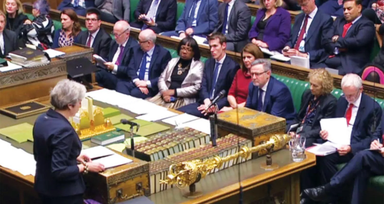 ماي خاطبت مجلس العموم في لندن أمس (أ.ف.ب)
