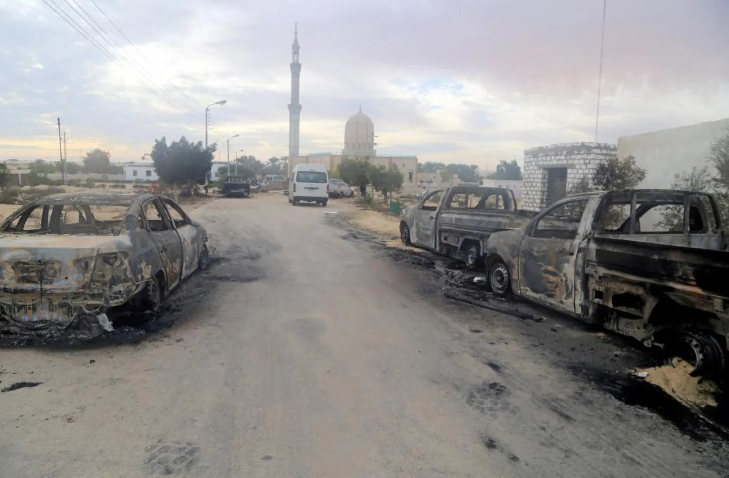 Damaged vehicles are seen after a bomb exploded at al-Rawdah mosque in Bir al-Abed, Egypt November 25, 2017. (Reuters)