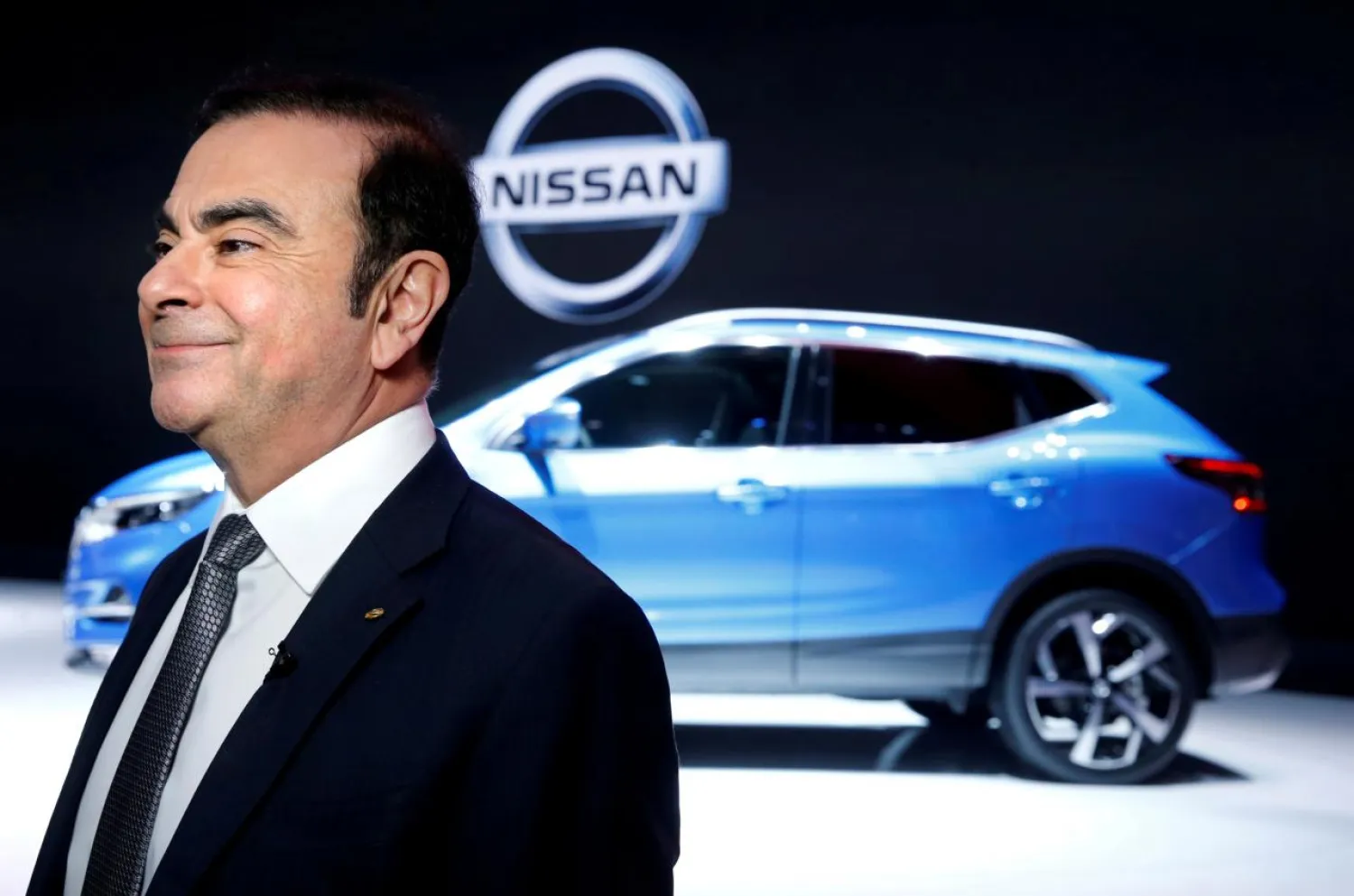 FILE PHOTO: Carlos Ghosn, Chairman and CEO of the Renault-Nissan Alliance, smiles before an interview during the 87th International Motor Show at Palexpo in Geneva, Switzerland, March 7, 2017. REUTERS/Denis Balibouse/File Photo