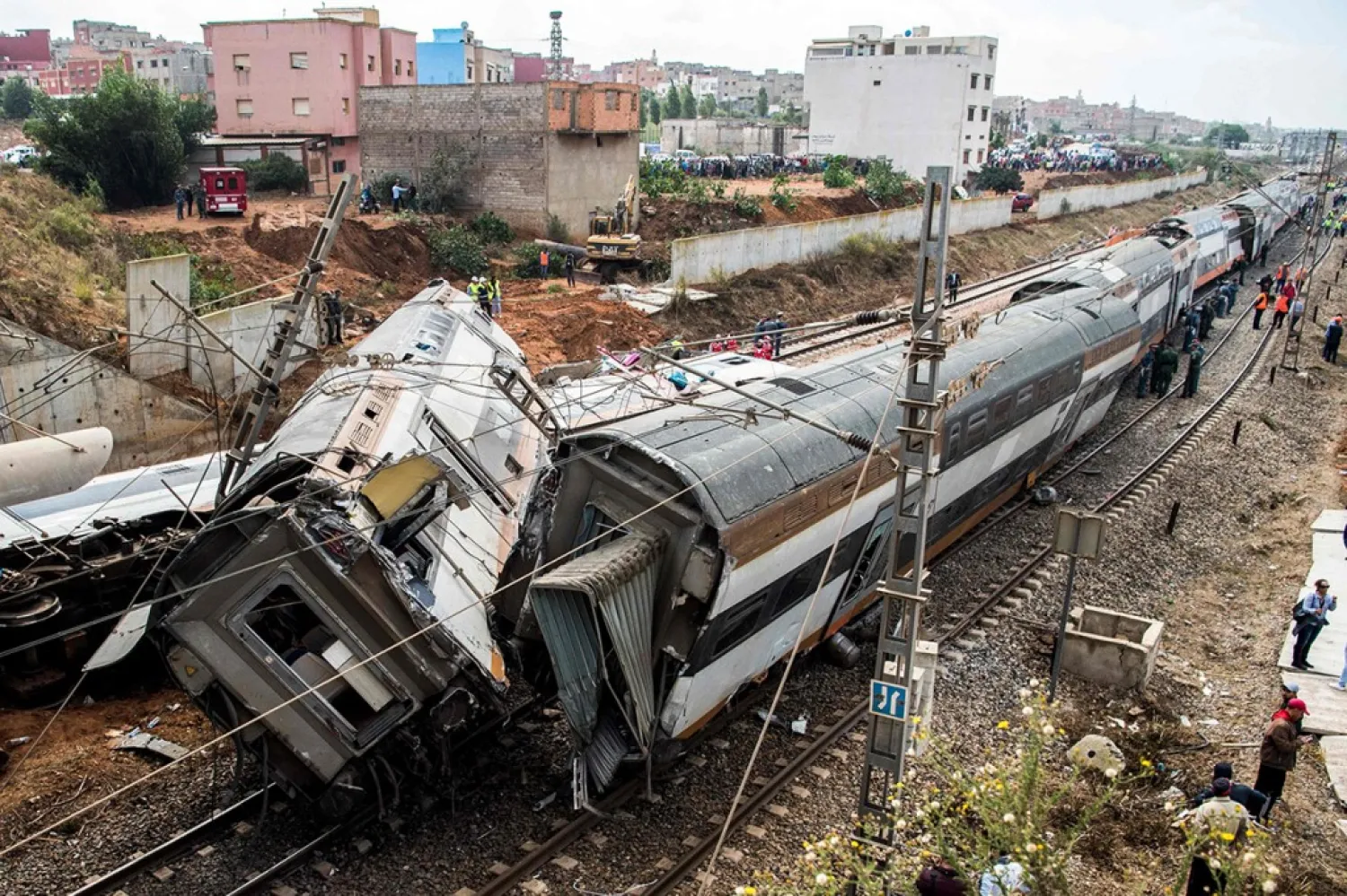 This picture taken on October 16, 2018 shows the scene of a rail accident in the Moroccan town of Bouknadel, between the capital Rabat and the port city of Kenitra to its north | AFP