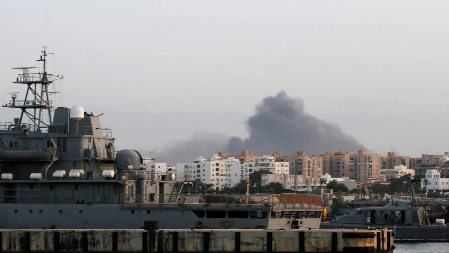 Smoke rises during clashes between rival militias in Tripoli, Libya in May 2017. (Reuters)