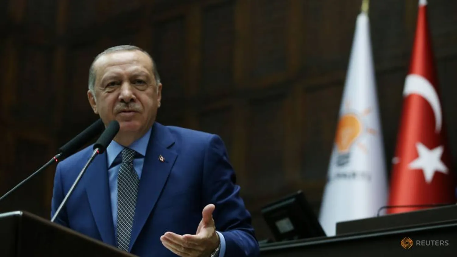 FILE PHOTO: Turkish President Tayyip Erdogan addresses members of parliament from his ruling AK Party (AKP) during a meeting at the Turkish parliament in Ankara, Turkey, October 30, 2018. Murat Cetinmuhurdar/Presidential Press Office/Handout via REUTERS