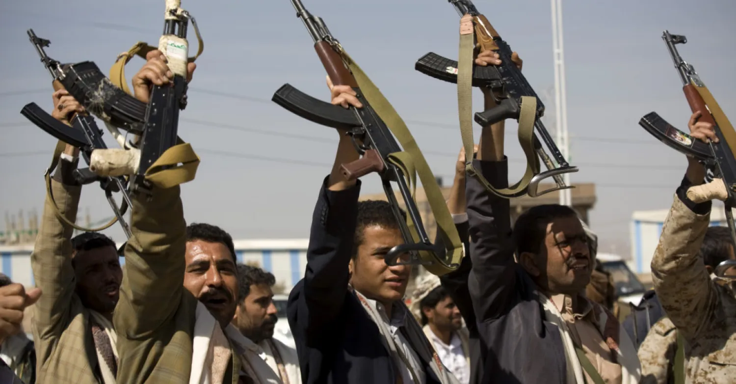Houthis raise their weapons in Sanaa, Yemen, Jan. 19, 2015. AP/Hani Mohammed