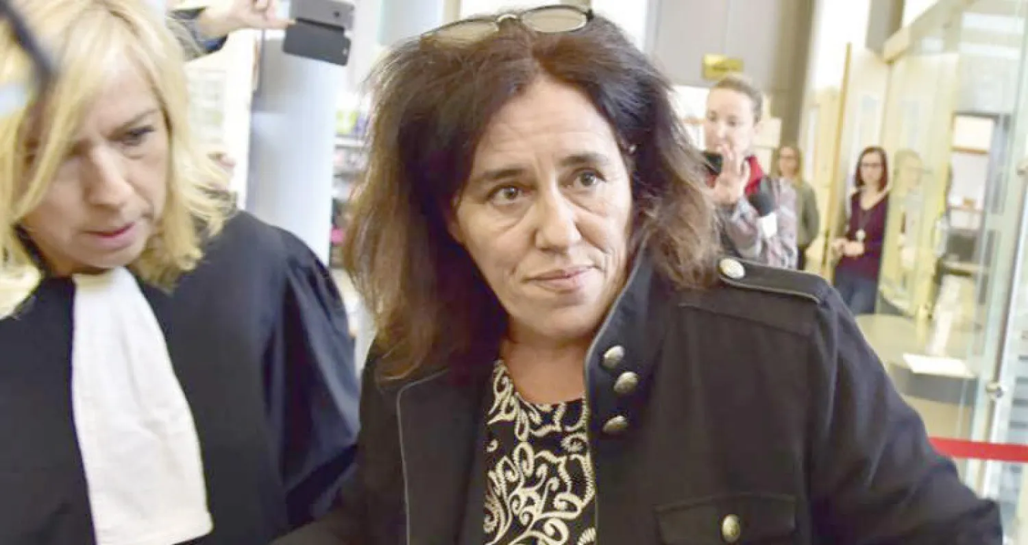 المتهمة ماريا مع محاميتها