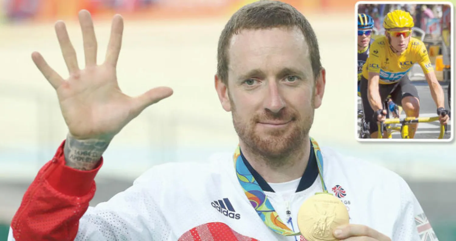 ويغينز بطل سباق الدراجات البريطاني يشير لذهبياته الخمس - ويغينز عندما حصد سباق فرنسا الدولي عام 2012