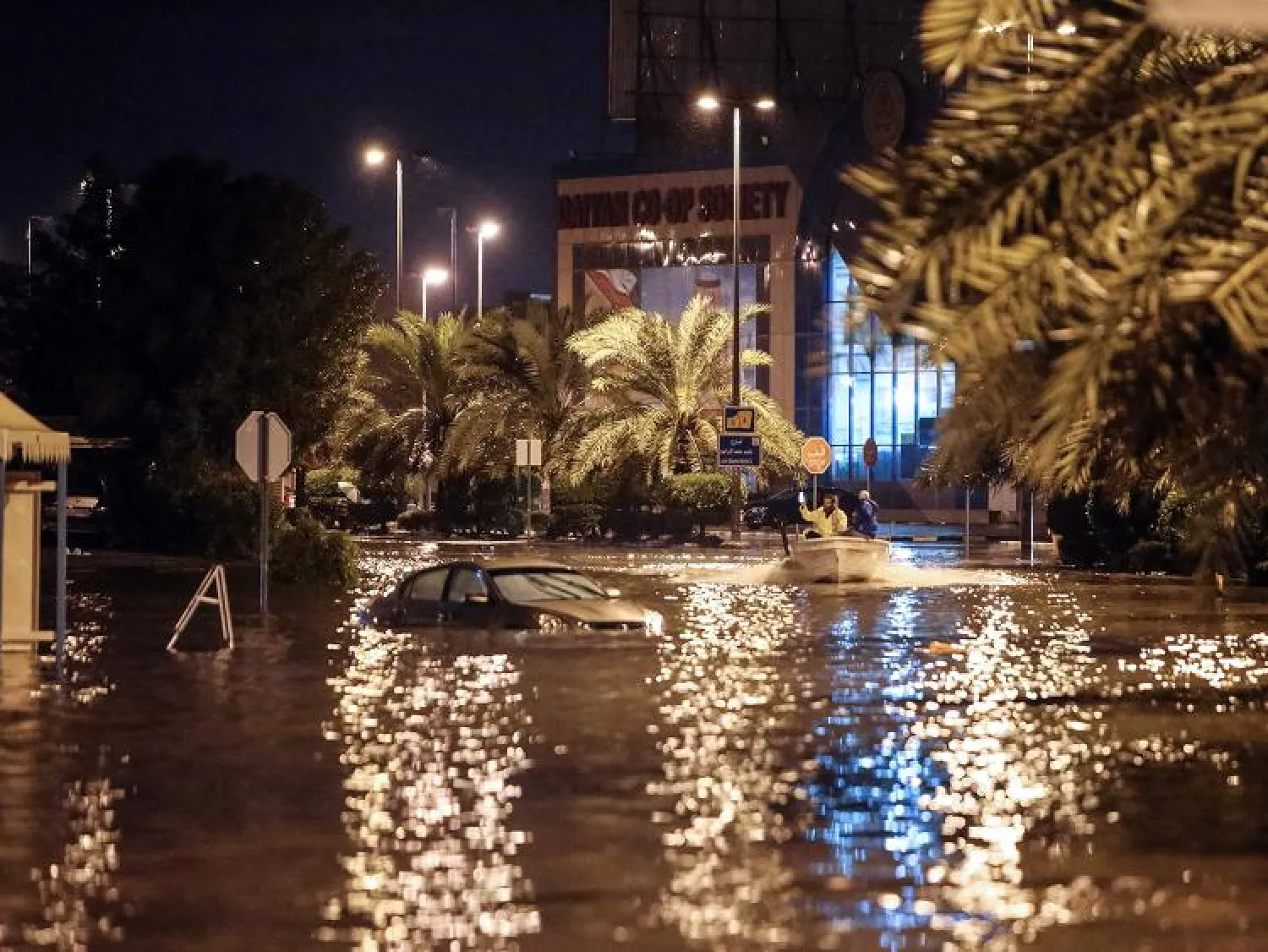 The flooded main road of the Daeya area of Kuwait city late on November 14, 2018, following heavy rain. Image Credit: AFP