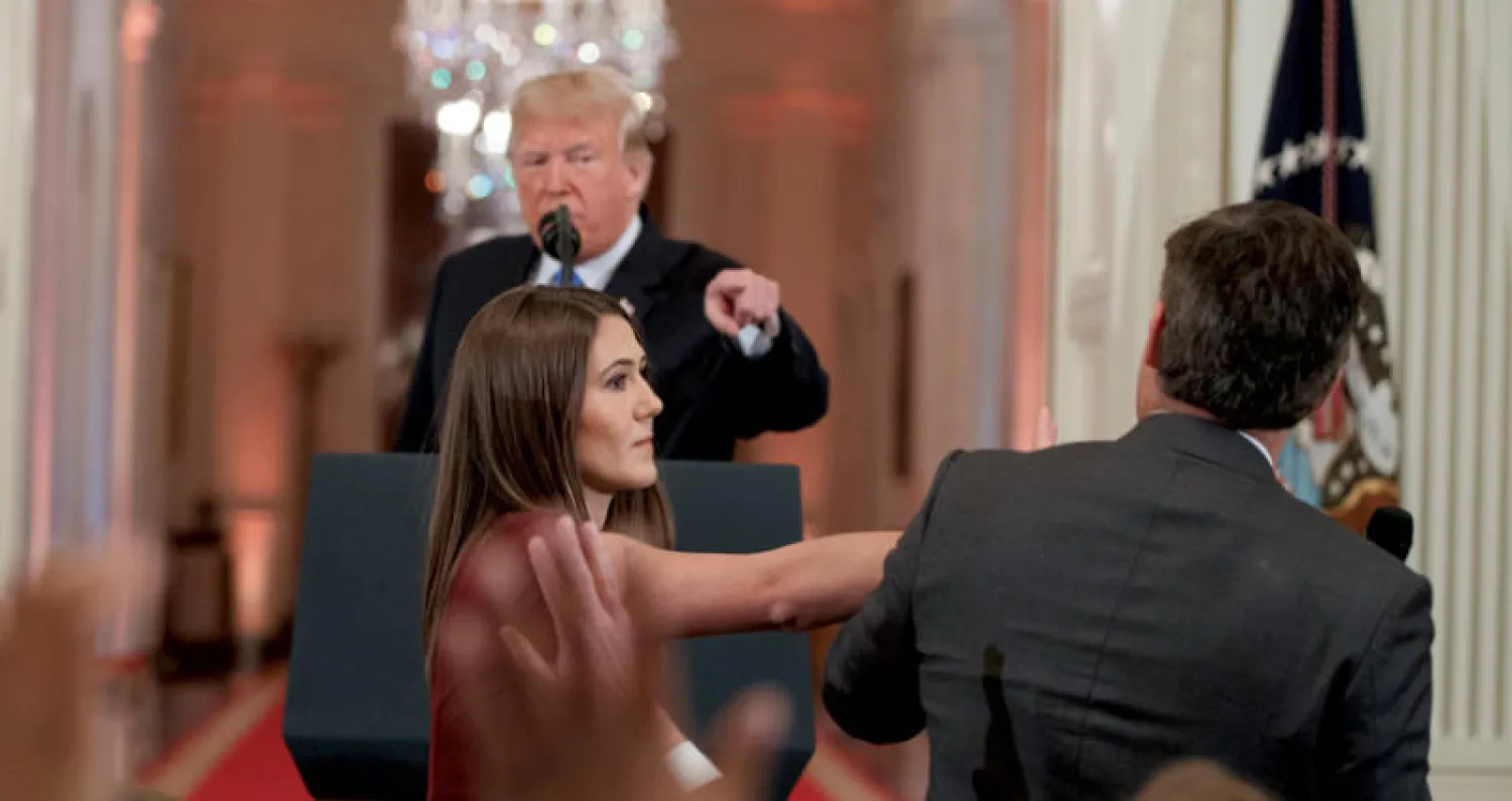 خلال المشادة الكلامية في البيت الأبيض بين الرئيس ومراسل سي إن إن (أ.ب)