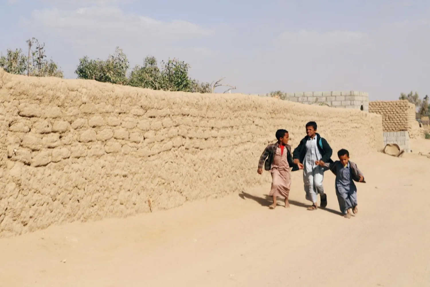 Boys walk in Saada, Yemen February 27, 2018. (File Photo: Reuters)

