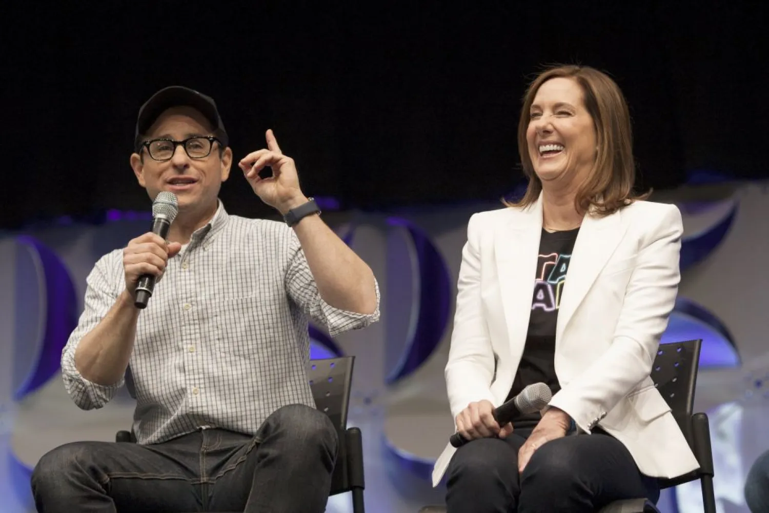 Star Wars: The Force Awakens' writer, director and producer J J Abrams, left and producer Kathleen Kennedy appear at the kick-off event of the Star Wars Celebration convention in Anaheim, California, April 16, 2015. Photo: Reuters