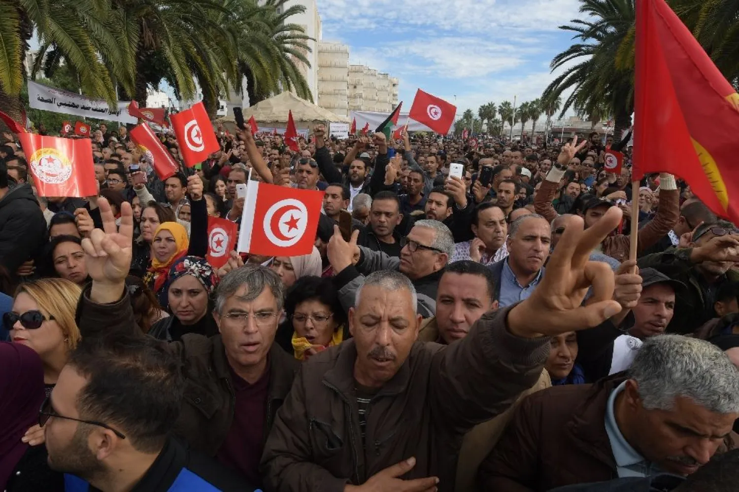 Tunisians protest in the capital Tunis during a general strike by civil servants on November 22, 2018 (AFP)