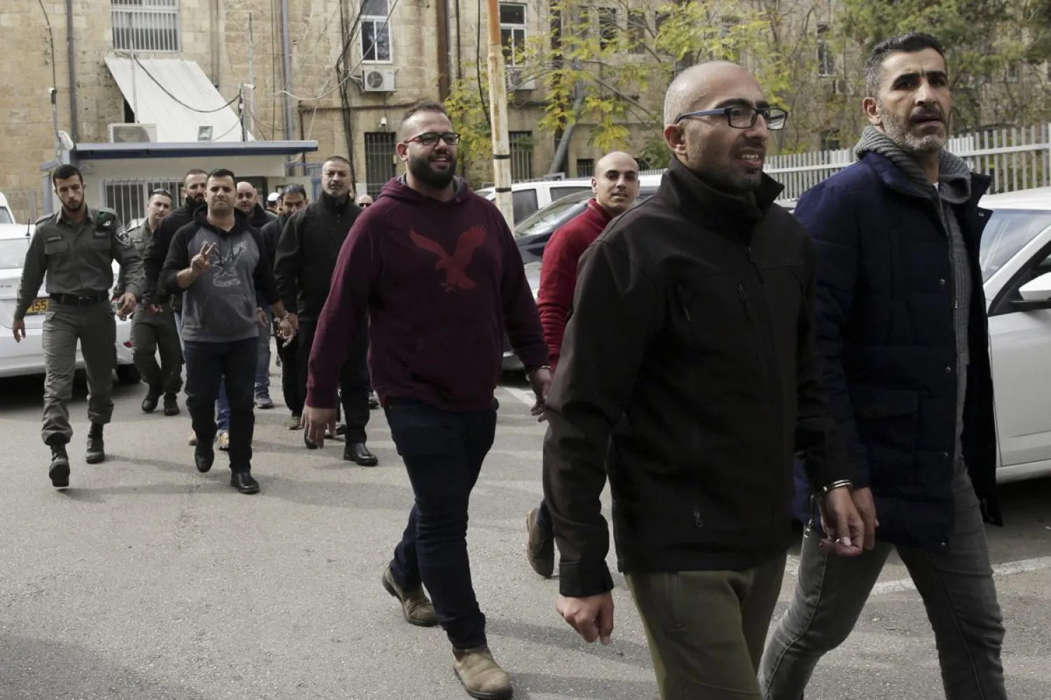 Arrested Palestinians are brought to a court in Jerusalem, Monday. (AP)