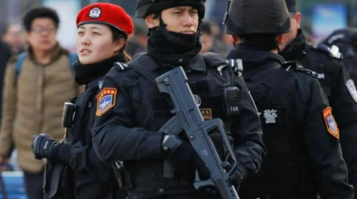 Çin polis görevlileri (Arşiv- Reuters)