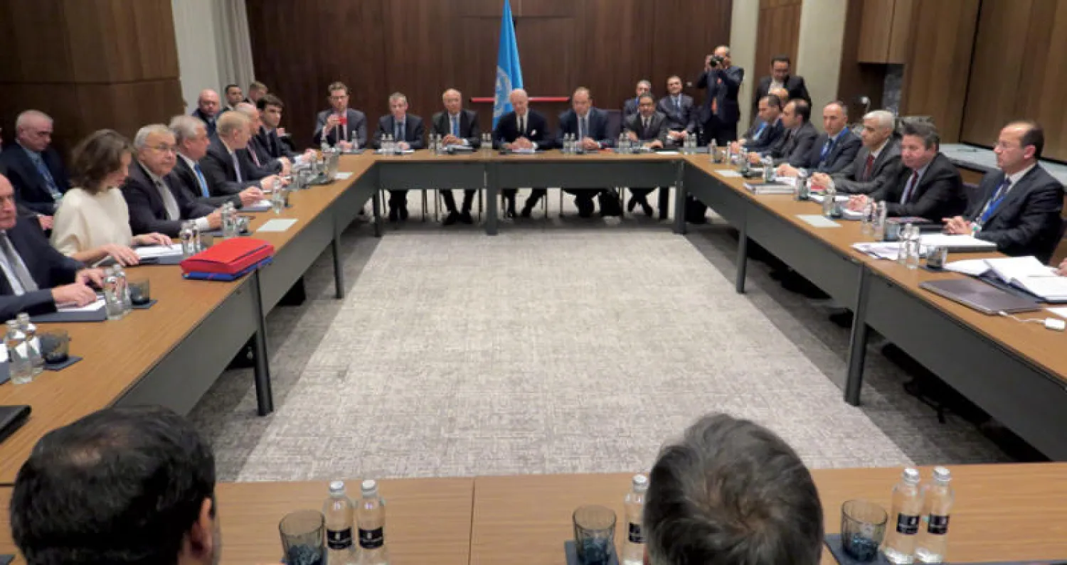 صورة للمشاركين في الجولة الحادية عشرة لاجتماعات آستانة امس (غيتي)