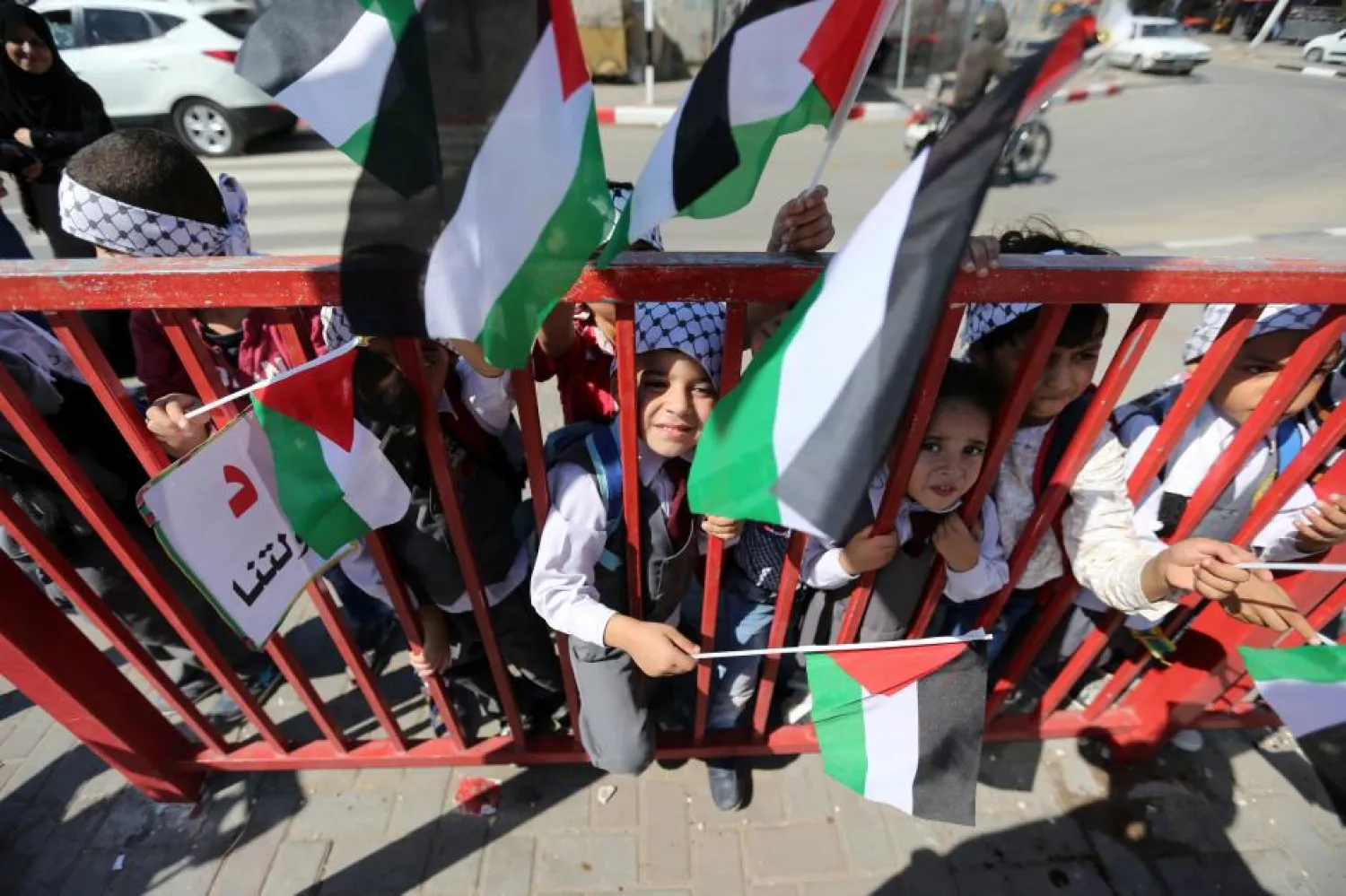 Children hold Palestinian flags during celebrations. Reuters file photo