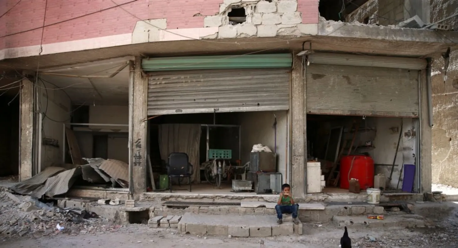 A destroyed shop in the eastern Damascus suburb of Ghouta on July 19. (Reuters)