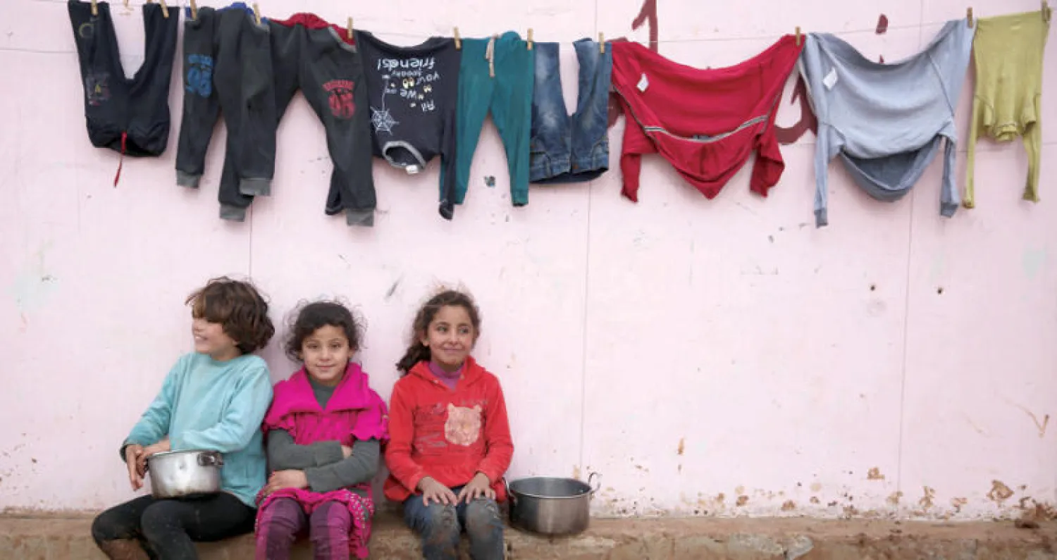 اطفال نازحون شمال سوريا قرب حدود تركيا (أ. ف. ب)