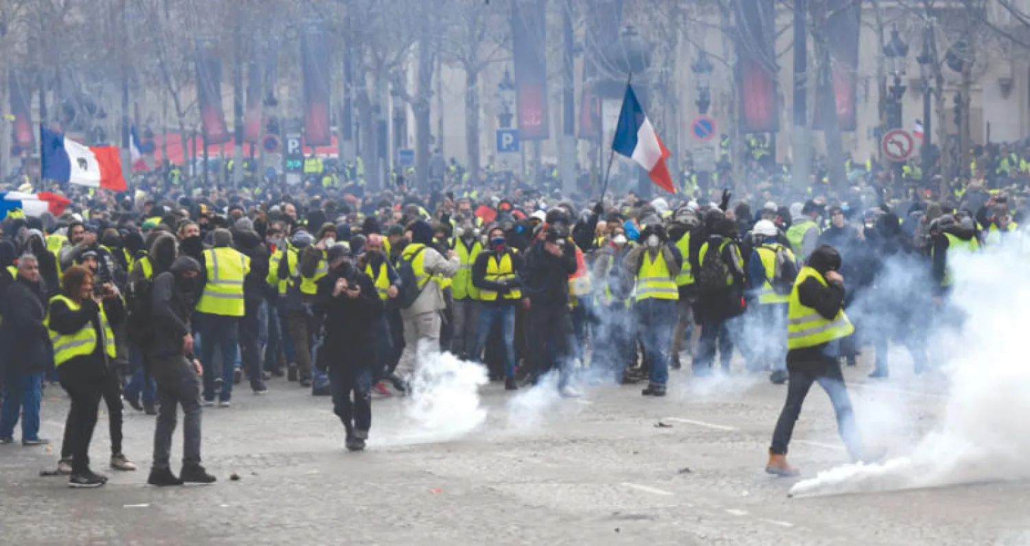 جانب من الاحتجاجات التي شهدتها باريس للسبت الرابع على التوالي (أ.ف.ب)