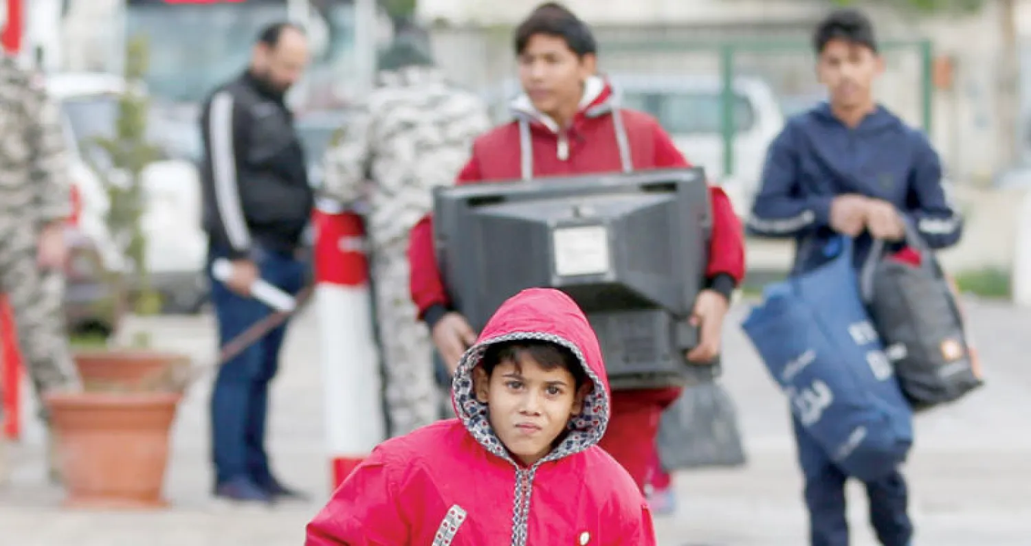 نازحون سوريون في لبنان يحضّرون  أنفسهم للعودة إلى بلدهم (رويترز)