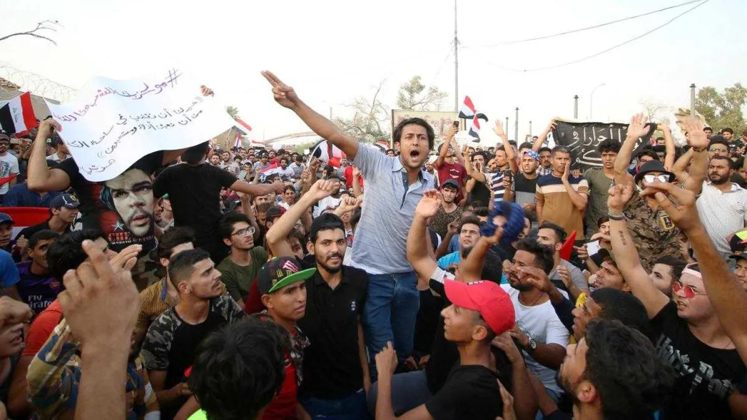 People shout slogans during a protest near the main provincial government building in Basra. (File Photo: Reuters)