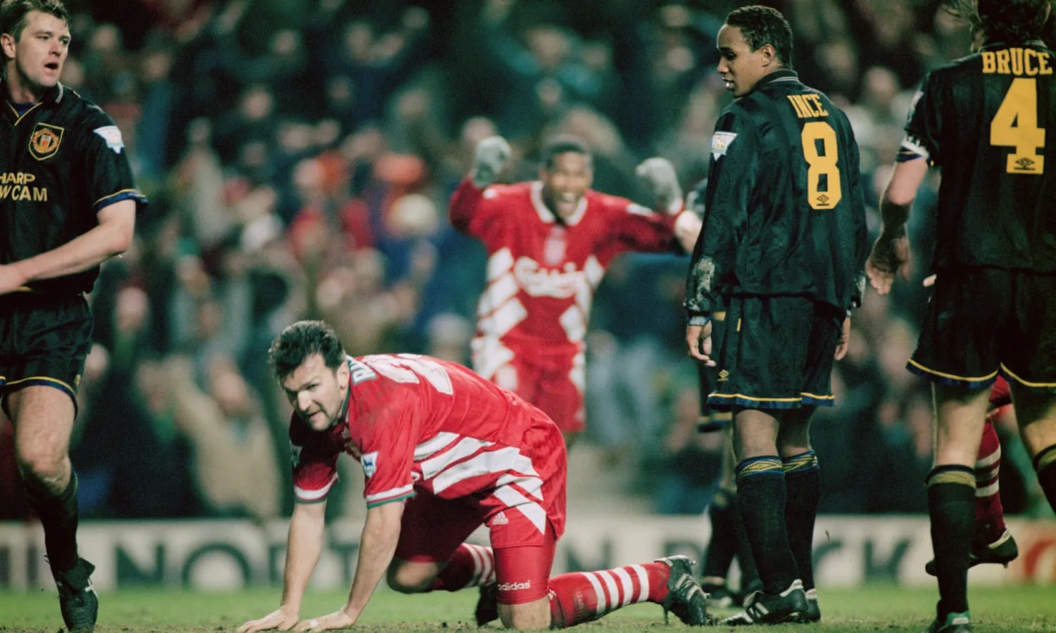 Neil Ruddock heads in Liverpool’s third goal as they came back from 3-0 down to earn a draw at Anfield in 1994. Photograph: Clive Brunskill/Getty Images