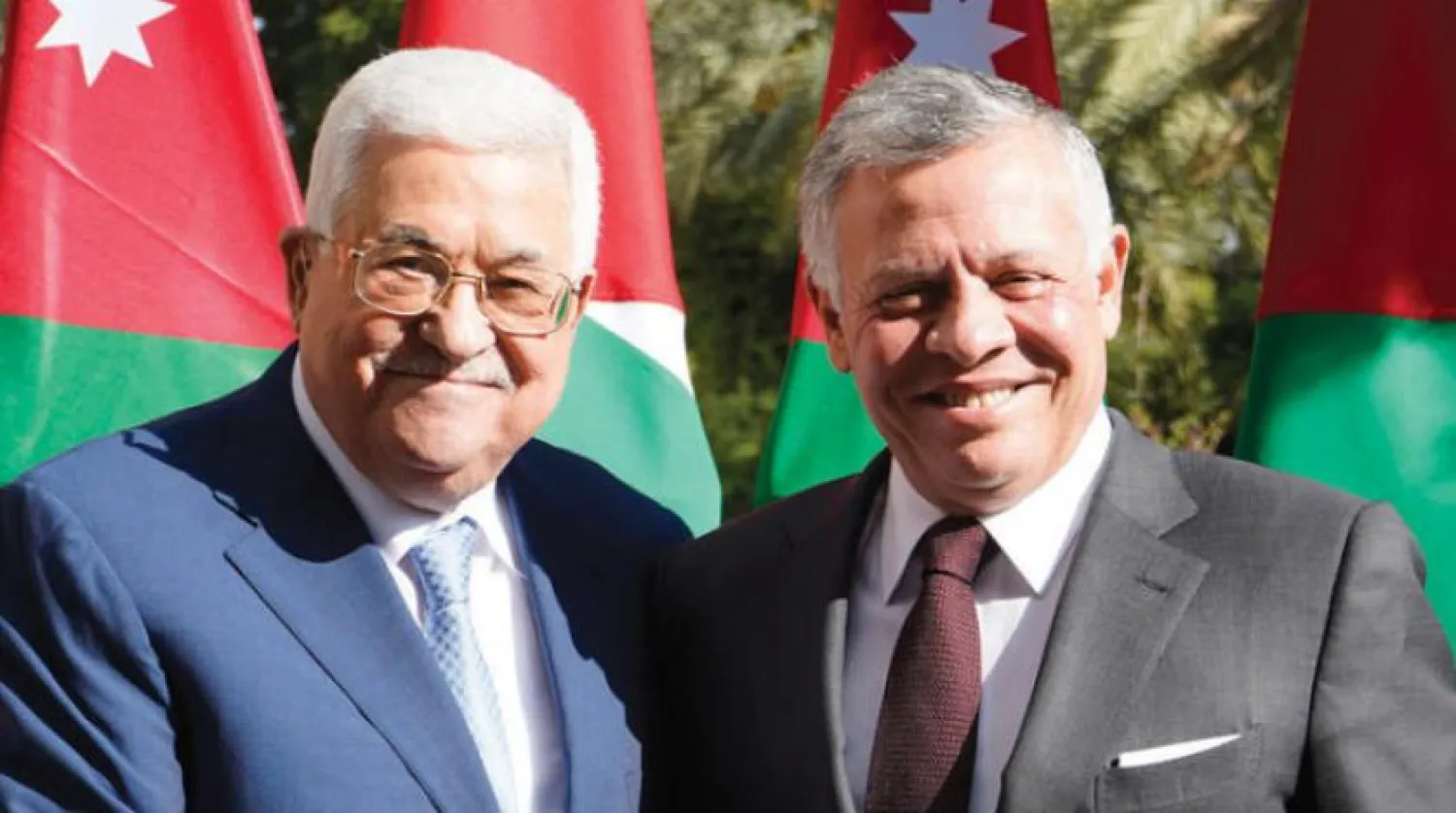 A handout picture released by the Jordanian Royal Palace on December 18, 2018, shows Jordanian King Abdullah II (R) meeting with Palestinian President Mahmoud Abbas at Basman Palace in Amman. 
Yousef ALLAN / AFP / Jordanian Royal Palace