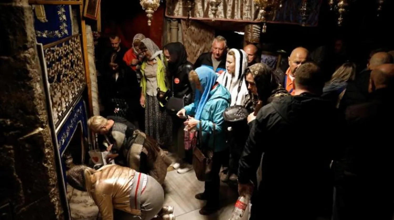 Beytüllahim’deki Doğuş Kilisesi’nde bir grup turist (AFP)