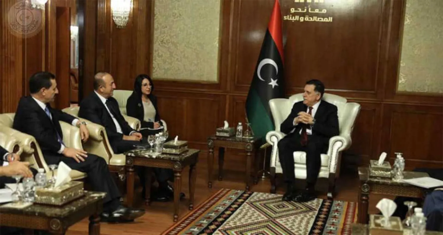 فائز السراج يلتقي وزير الخارجية التركي مولود أوغلو في طرابلس أمس (فيسبوك)