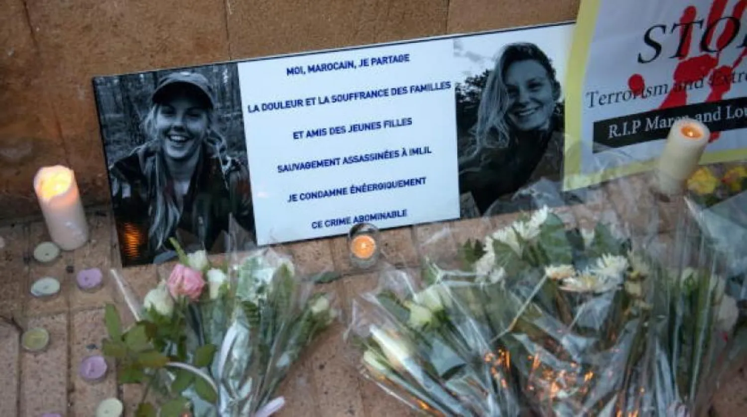 Rabat’taki Danimarka Büyükelçiliği önünde kurbanların fotoğrafları (EPA)
