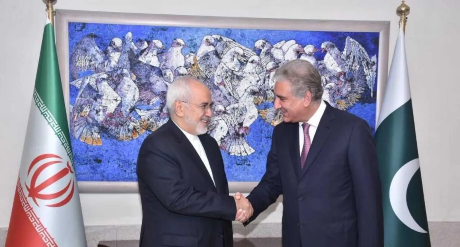 Iranian Foreign Minister Mohammed Javad Zarif (left) with Pakistani Foreign Minister Shah Mahmood Qureshi in Islamabad. (Courtesy photo)