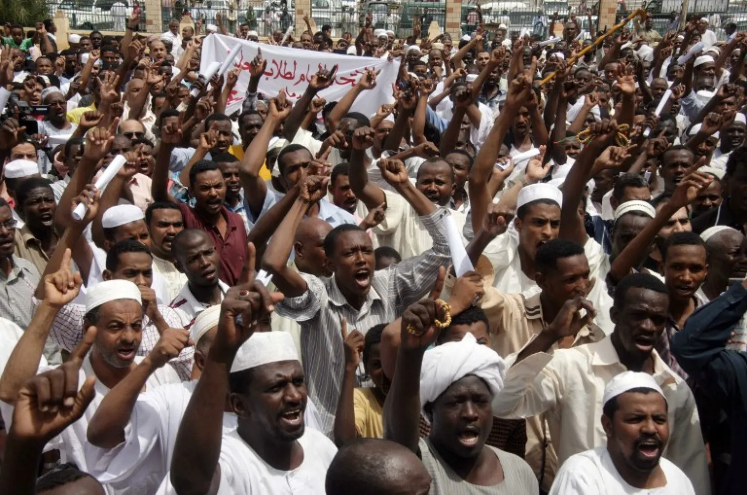 Sudanese men shout slogans during a protest against Israel's military operation in the Gaza Strip in the capital Khartoum. (File Photo: AFP/EBRAHIM HAMID)

