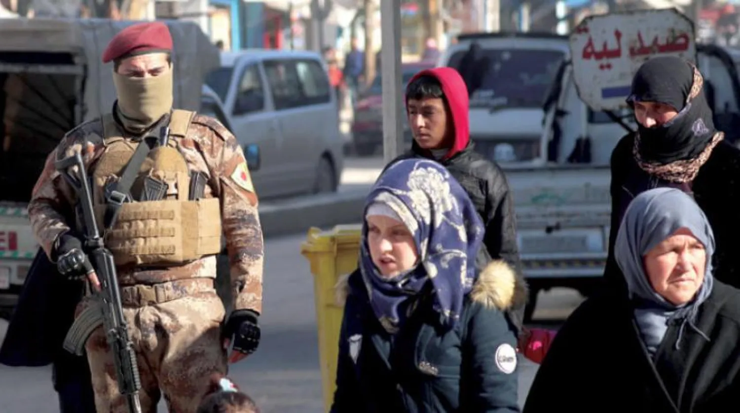 “Menbiç Askeri Konseyi” kuvvetlerine bağlı bir asker
