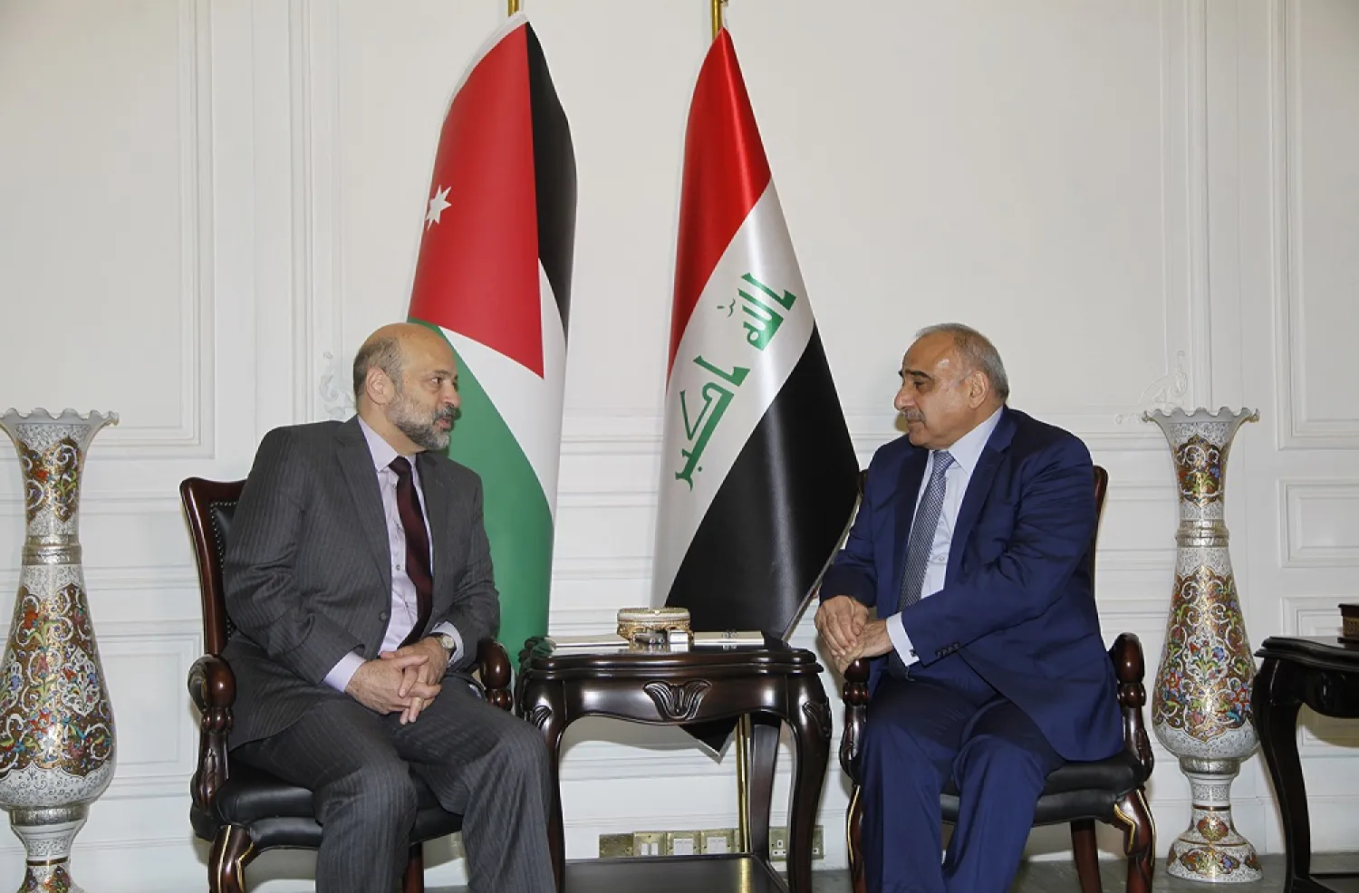 Jordanian PM Omar al-Razzaz meets his Iraqi counterpart Adel Abdul Mahdi. (Petra)