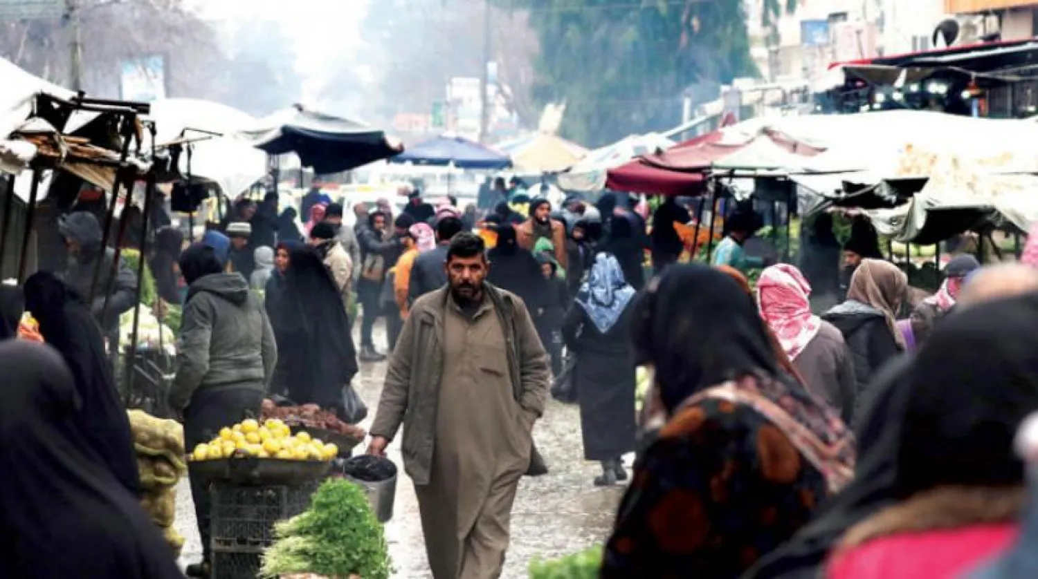 Menbiçliler şehrin akıbetini bekliyor (AFP)