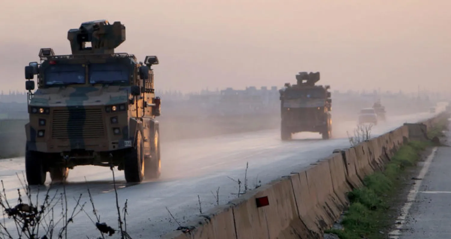 قافلة عسكرية تركية في طريقها إلى منبج شمال سوريا نهاية العام الماضي (أ.ف.ب)
