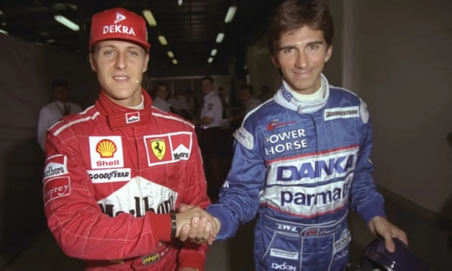  Damon Hill with his rival Michael Schumacher in March 1997: ‘Although I didn’t agree with his approach, I know the pressure he was under’. Photograph: Pascal Rondeau/Getty Images
