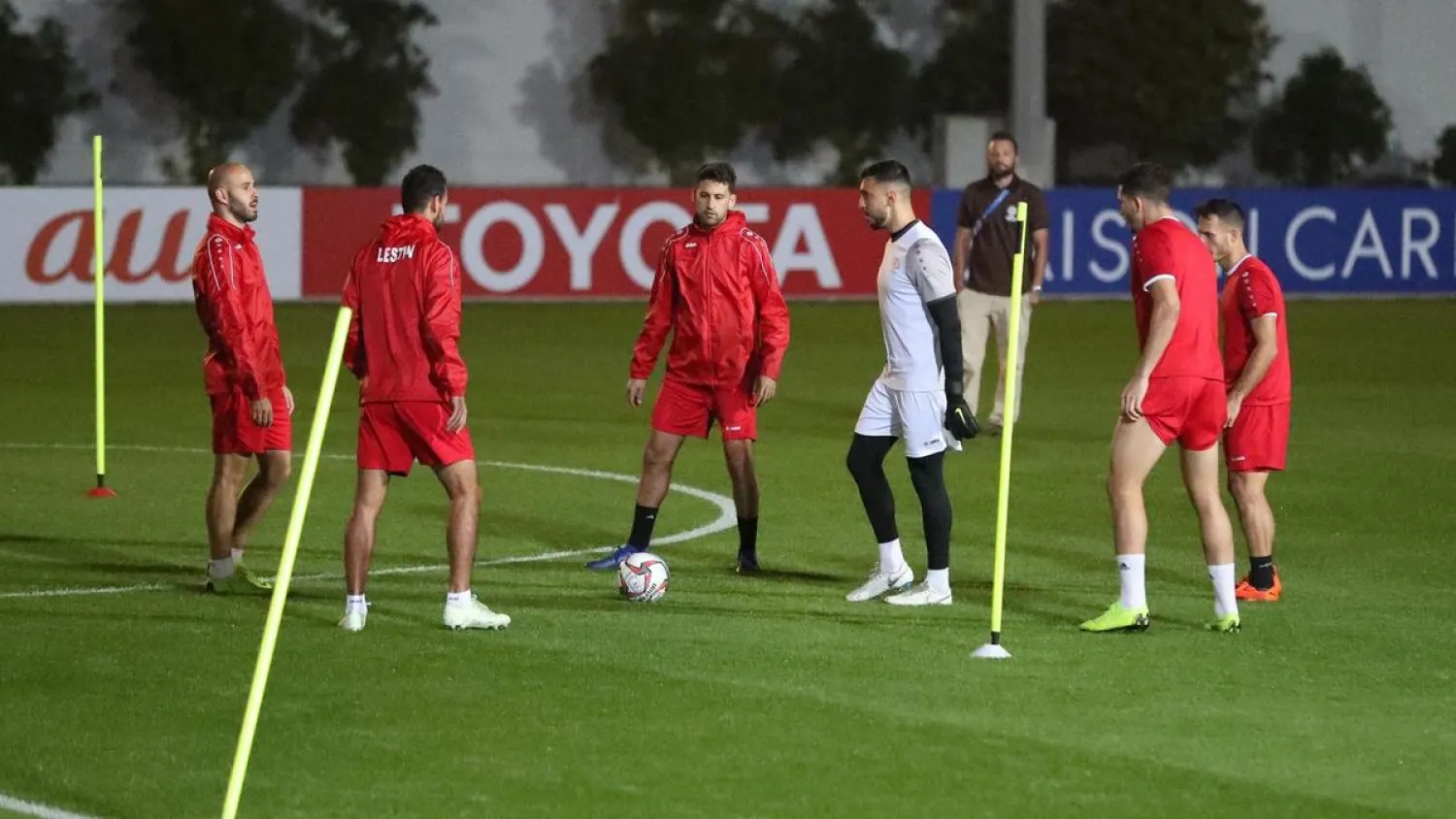 Palestine players take part in a training session in Sharjah ahead of their opening match at the 2019 Asian Cup in the UAE, against Syria. (AFP)