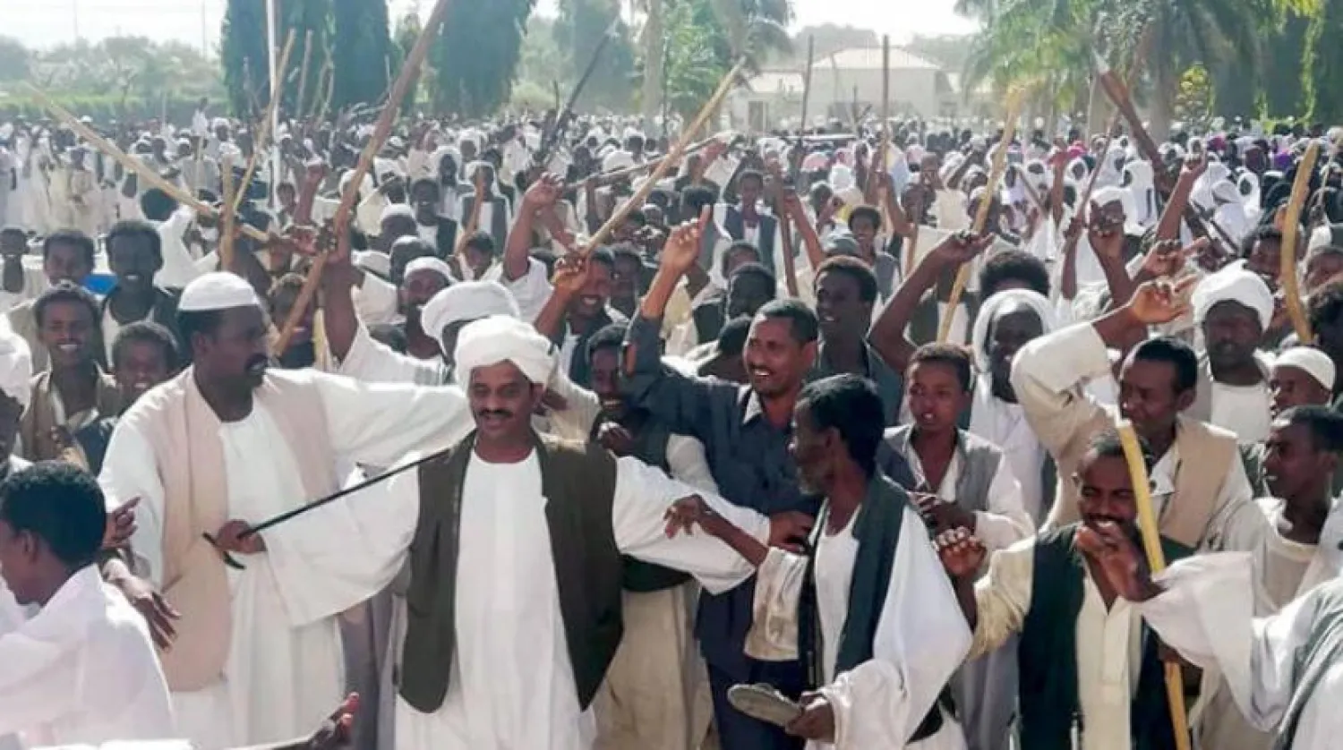 Sudan’ın doğusunda bulunan Kassala kentindeki Beşir destekçileri (AFP)