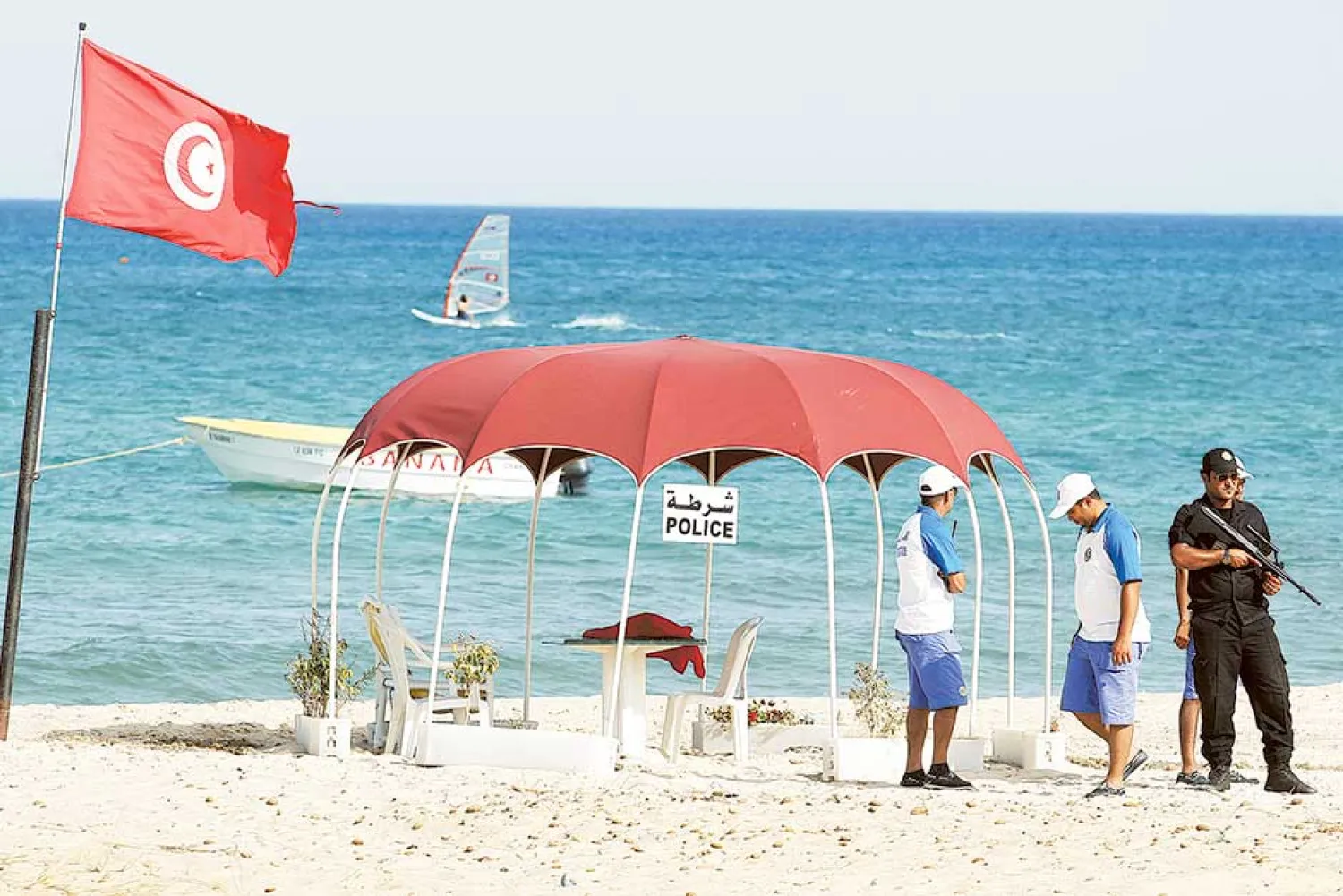  Tourist police officers patrol the beach in Hammamet, Tunisia.

