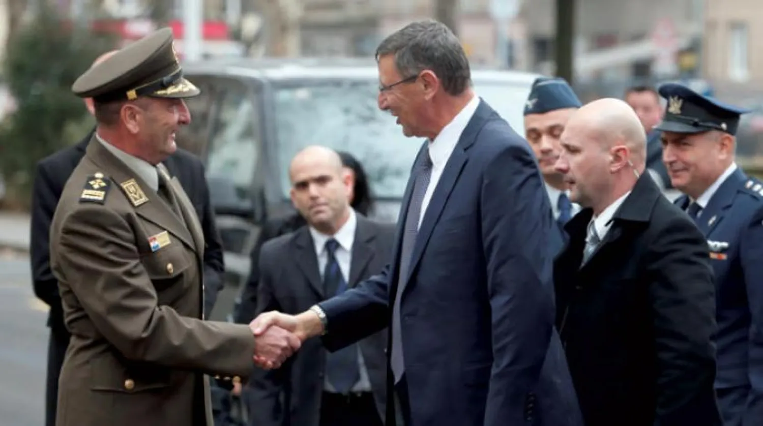 Israel's delegation led by Ehud Adam, center, Director General of the Israeli Ministry of Defense, is welcomed by Mirko Sundov, Chief of Staff of Croatia's armed forces upon their arrival to the Croatian Ministry of Defense in Zagreb, Croatia, Thursday, Jan. 10, 2019. (AP Photo/Darko Bandic)