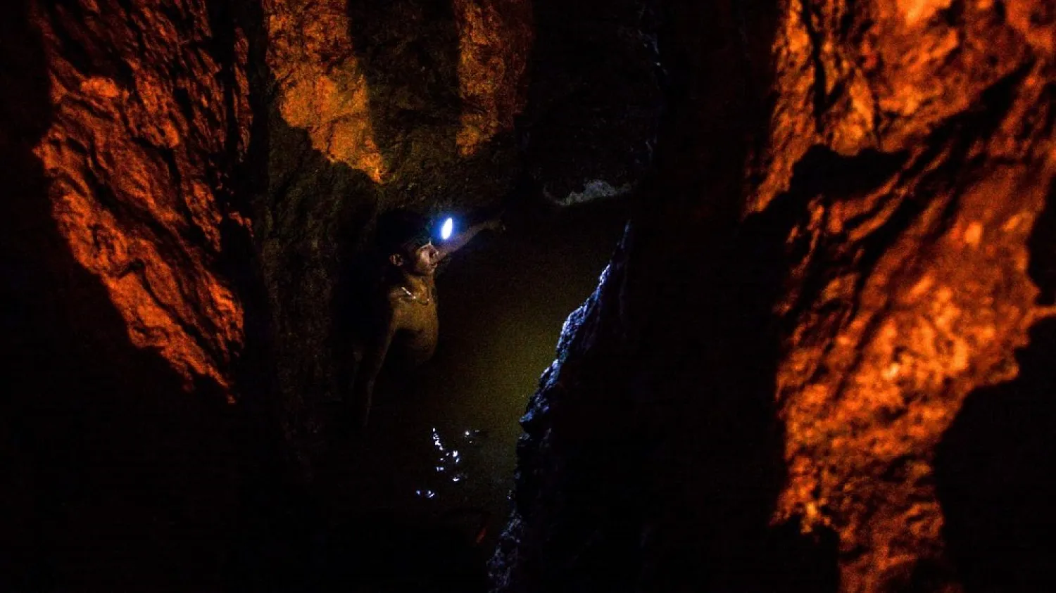 A miner looks for gold at La Culebra gold mine in El Callao, which sits in Venezuela's Orinoco Mining Arc. (AFP)