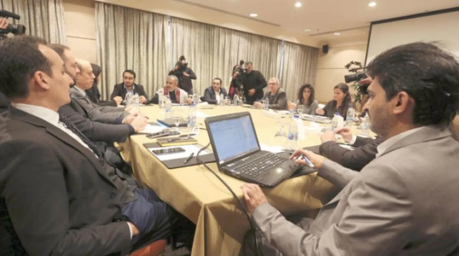 Delegates discuss a prisoner swap deal in Amman, Jordan January 17, 2019. REUTERS/Muhammad Hamed