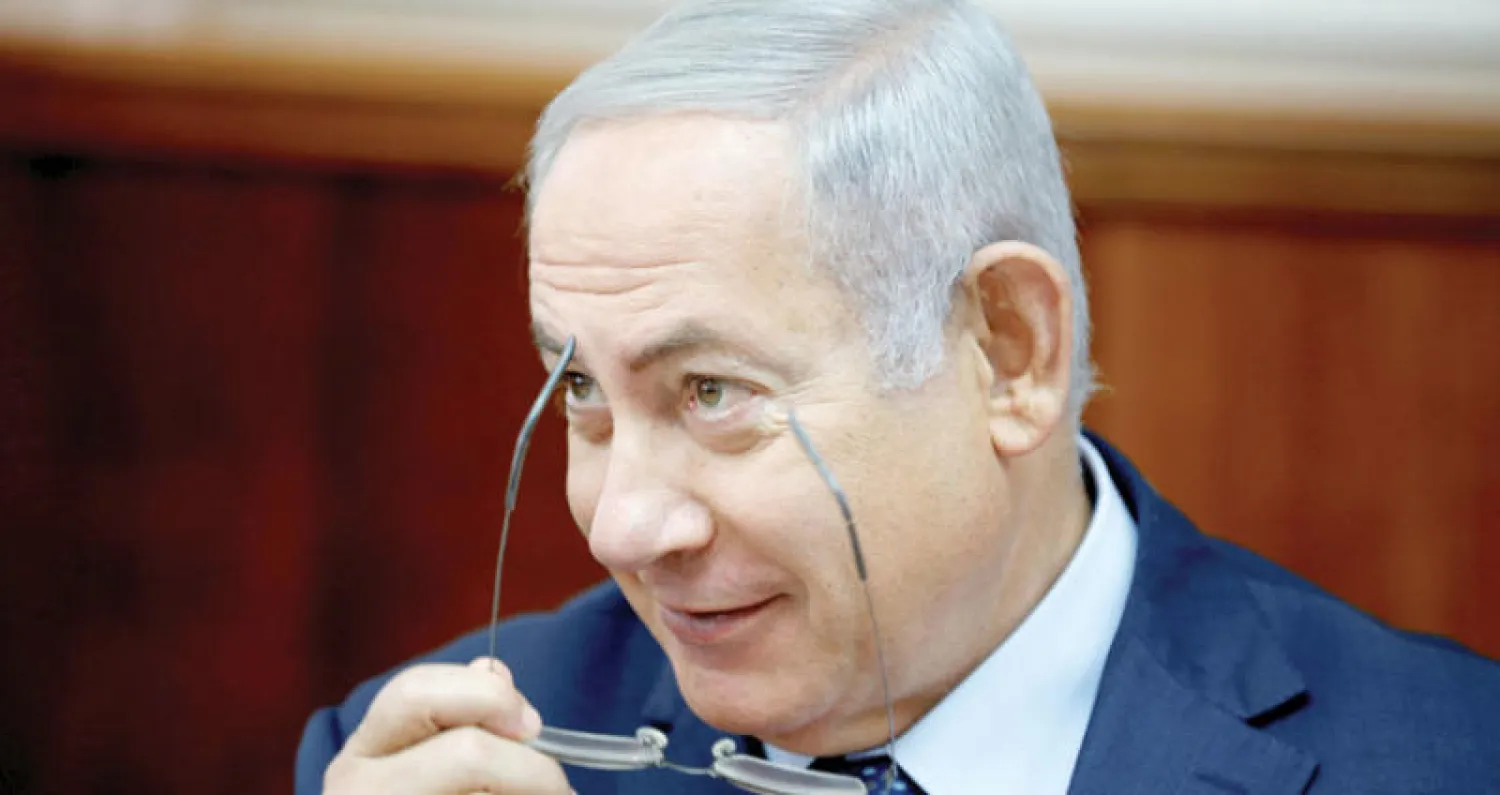 يواجه نتنياهو احتمال اتهامه بملفات فساد (رويترز)