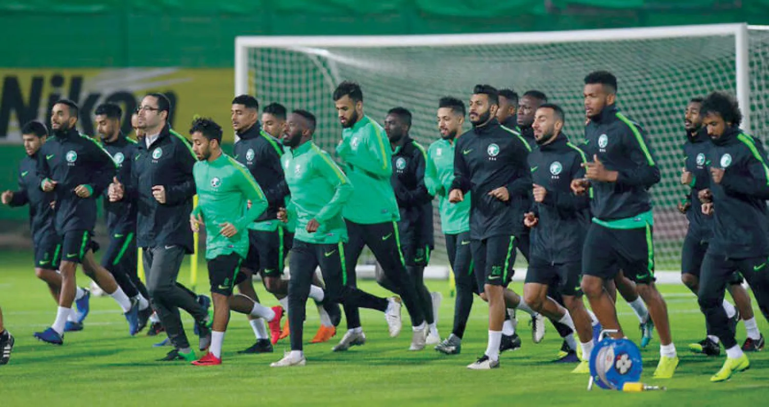 لاعبو الأخضر خلال استعداداتهم لليابان (الشرق الأوسط)