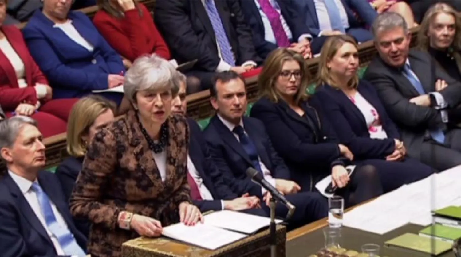 Theresa May milletvekilleri ile görüşmeden önce konuşma yaptı (AFP)