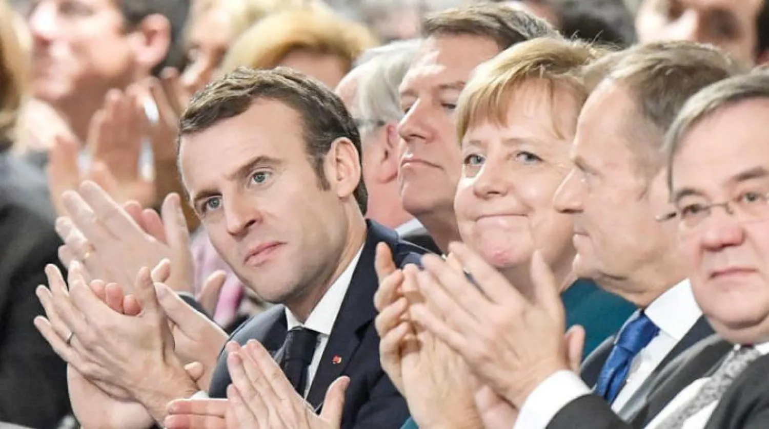 Merkel, Macron ve AB Başkanı Donald Tusk, Almanya- Fransa anlaşmanın imzaladı (AP)