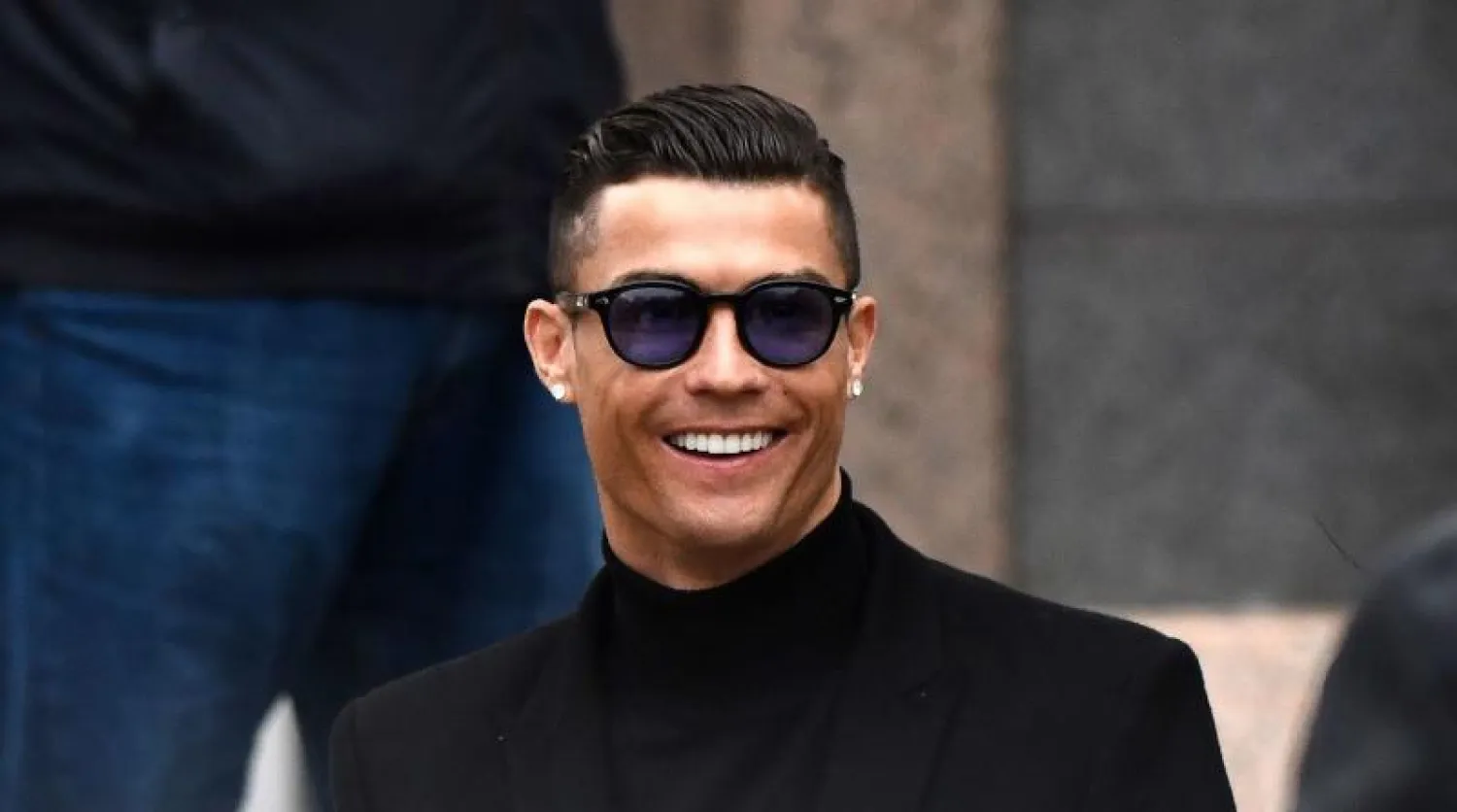 رونالدو يغادر محكمة في مدريد بعد اعترافه بالتهرب الضريبي والحكم عليه بغرامة 18.8 مليون يورو (أ.ف.ب)