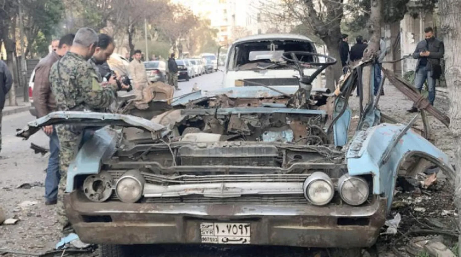 People gather at a site of a car bomb blast in Damascus, Syria January 24, 2019. REUTERS/Firas Makdesi