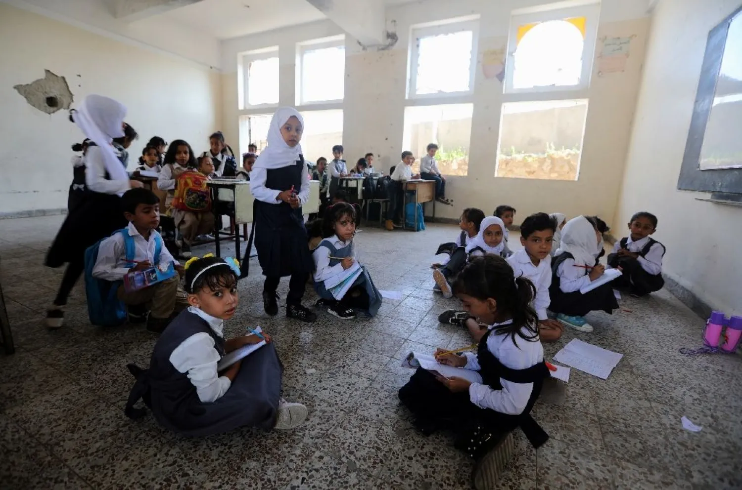 Pupils study in a classroom at a school in the Yemeni city of Taiz. (AFP)